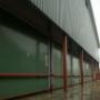 Bedrijfgebouw te houten
