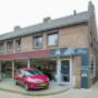 Voorkant winkel met werkplaats
