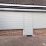 Knik-armscherm en rolluik comb