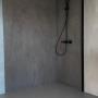 Novellini douchewand met beton ciré