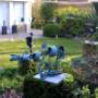 Tuin met bronzentuinbeelden