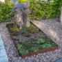 Grafmonument versteend hout en Cortenstaal