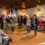 Bezoekers in zaal