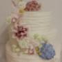 Door een bezoeker 03-01-2017 geüpload - bruidstaart ede met frosting en suikerbloemen