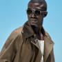 This mid green trench coat features a knee-length cut and a classic 6-on-2 double-breasted closure. Raglan shoulders, notched lapels, and a detachable belt add structure and style. Lined with sleeve straps.