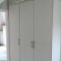 wandkast met rail voor trap