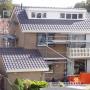 plaatsen nieuwe dakpannen