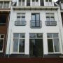 Gebosseerd stucwerk gevels