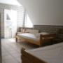 Slaapkamer met enkele bedden