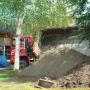 Zand lossen aan de zijkant
