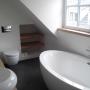 Badkamer schuine wand ligbad