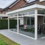 Hardglas schuifwanden met bovenlicht