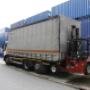 Vrachtwagen mt huif & Kooi–aap
