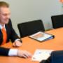 Ondertekening koopakte op kantoor