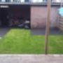 Aanleg achtertuin tegels/gazon