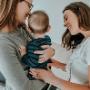 Chiropractor with mother & baby