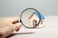 magnifier-house-pink-background-home-search-concept