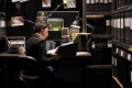 private-detective-reading-confidential-report