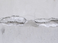 Loslatend stucwerk reparatie